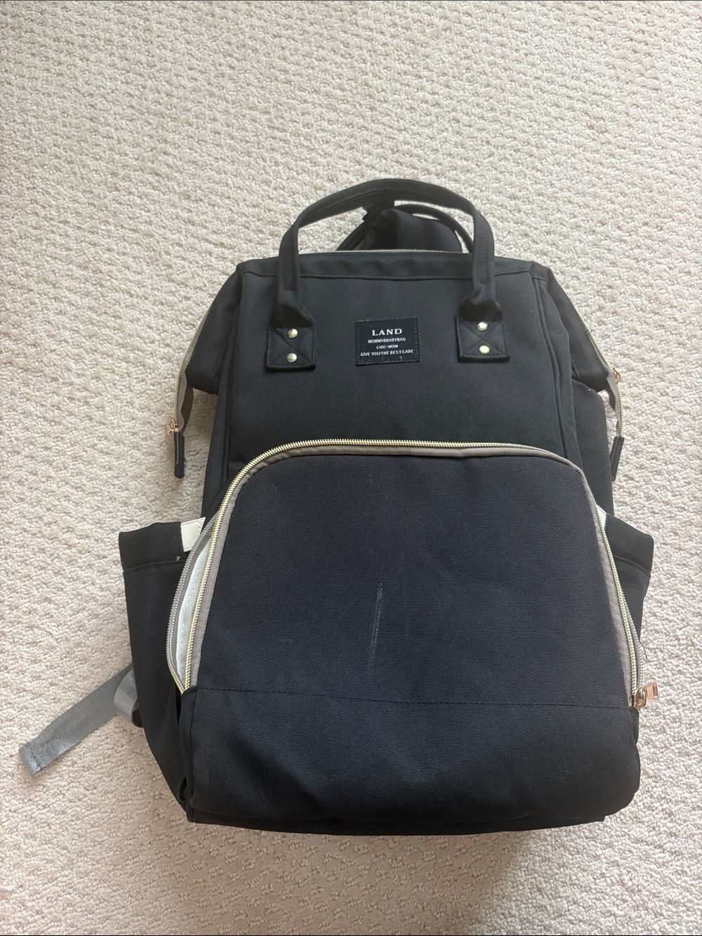 Amazon Black Baby Bag Backpack with Gold Accents